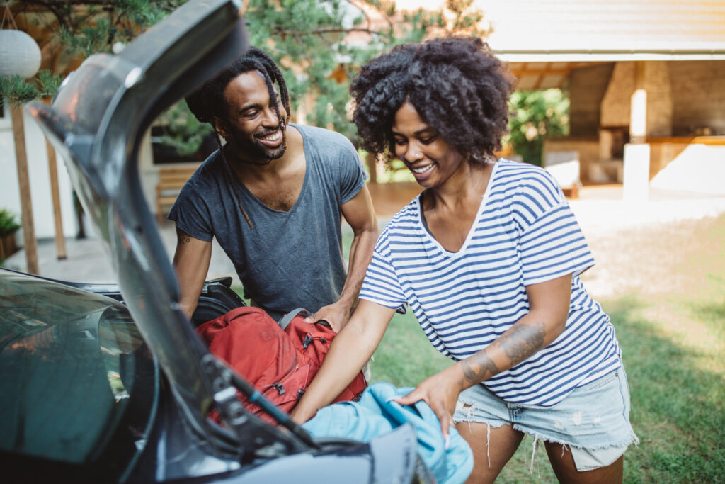 Couple Loading a Car
