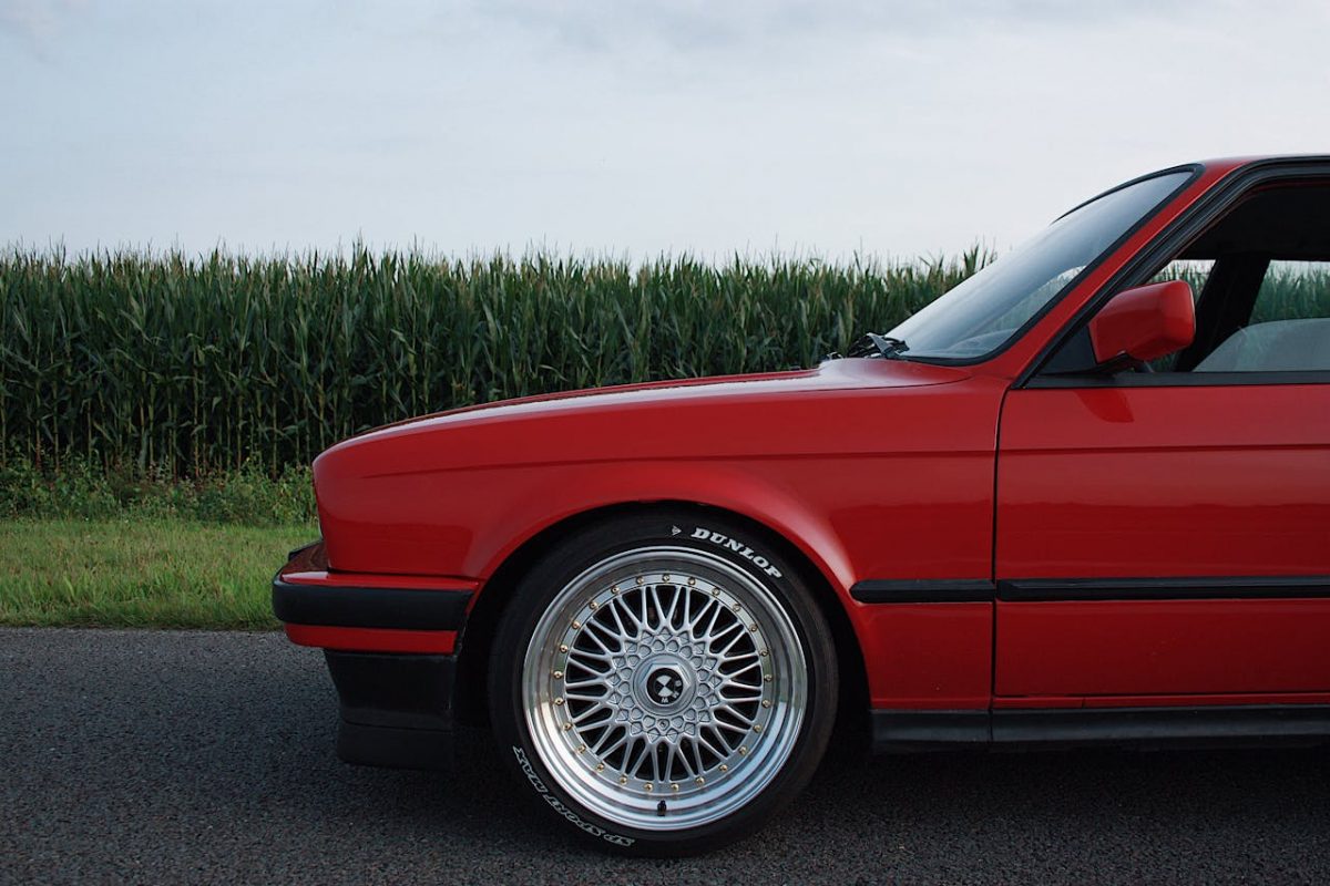 Red Old BMW on Road